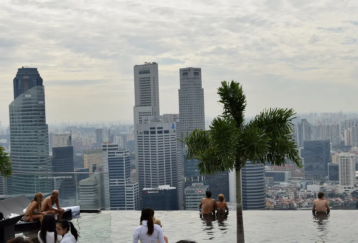 The infinity pool with the city skyline