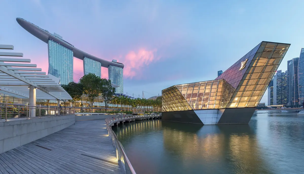 Marina Bay Sands at dusk from the promenade