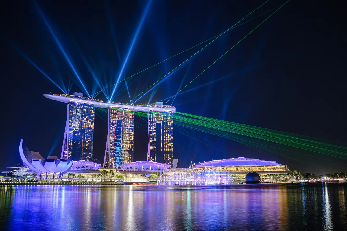 Light beams from Marina Bay Sands at night